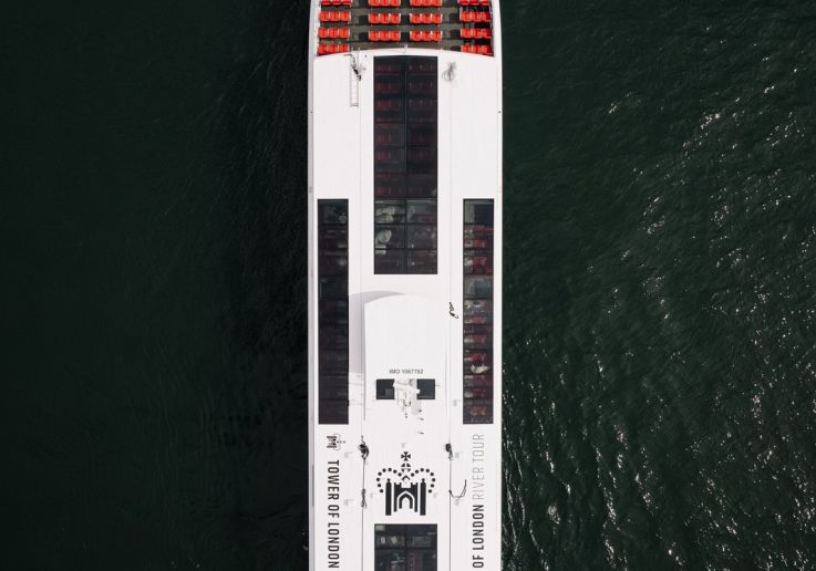 The Silver Raven seen from above, with red seats on the open deck