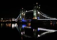 Tower Bridge lit up at night, next to Tower Bridge Quay where the Silver Bonito New Year's Eve cruise boards