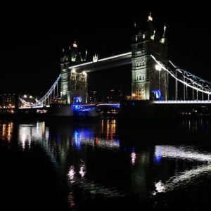 Tower Bridge lit up at night, next to Tower Bridge Quay where the Silver Bonito New Year's Eve cruise boards